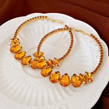 one pair stylish orange rhinestone round copper earrings(length:7.5cm)