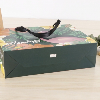 Fifty pcs new kraft paper flamingo festive supplies wedding candy portable packaging gift bag (size:28cm×21m×8cm)