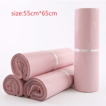 a hundred pcs pink solid color high quality express film bag(size:55cm*65cm)