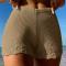 sexy slight stretch solid color polyester hollow beach shorts_Black_White_Khaki