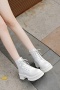 chic two colors pu leather thick bottoms strappy martin boots_Black_White