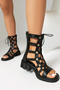 stylish retro rivet decor hollow out lace-up thick bottom sandals_Black