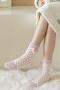 one pair stylish 8 colors heart decor lattice pattern coral fleece crew socks_Black_Gray_Pink