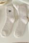 one pair new stylish 5 colors eye embroidery coral fleece crew socks_Black_White_Beige